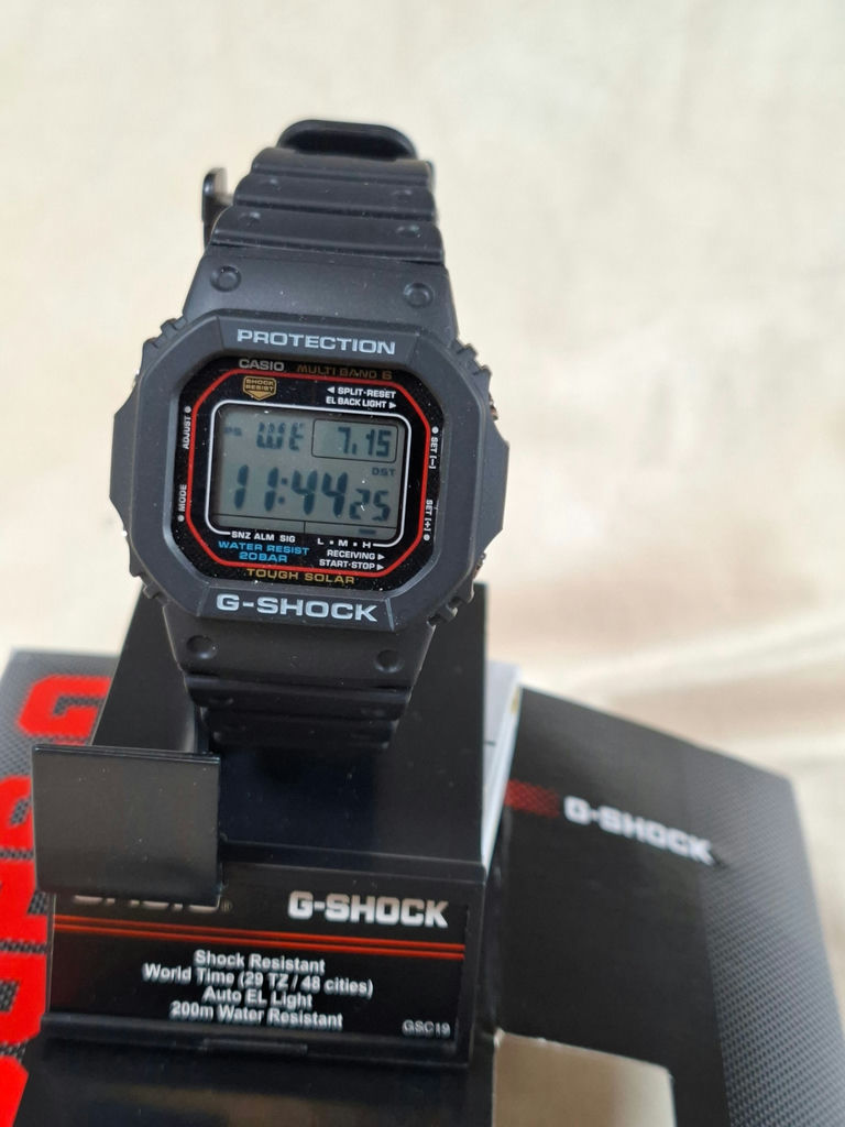 Casio G-Shock digital watch with display stand and box - image 3 of 8