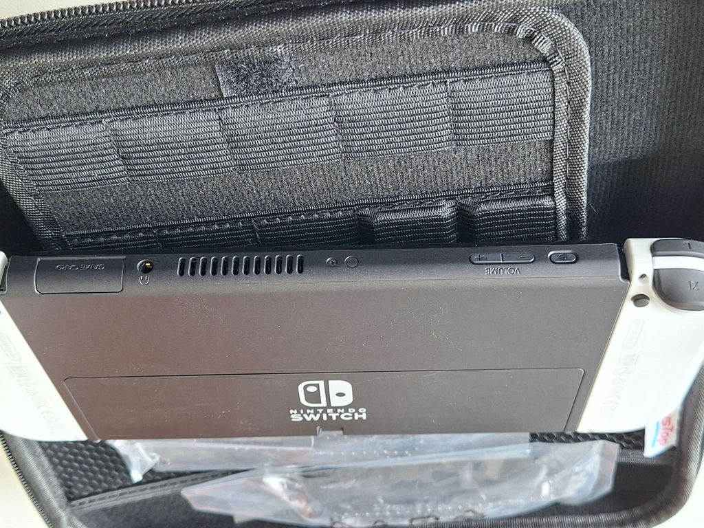 Nintendo Switch Console with Carrying Case and Game Cartridges - image 4 of 5