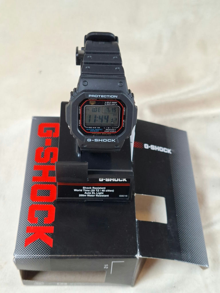 Casio G-Shock digital watch with display stand and box - image 1 of 8