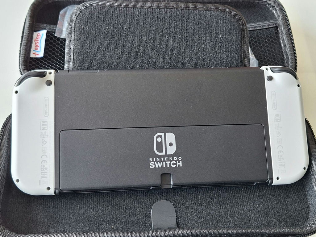 Nintendo Switch Console with Carrying Case and Game Cartridges - image 3 of 5