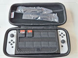 Nintendo Switch Console with Carrying Case and Game Cartridges - thumbnail 1 of 5