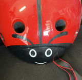 Green Schwinn bicycle helmet and red ladybug helmet - thumbnail 3 of 3