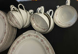 Porcelain dinnerware set with pink floral border and gold trim - thumbnail 4 of 6