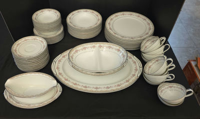 Porcelain dinnerware set with pink floral border and gold trim - Image 1 of 6
