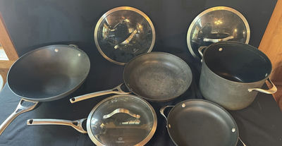 Calphalon cookware set with pots, pans, and glass lids - Image 1 of 11