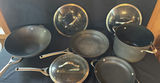 Calphalon cookware set with pots, pans, and glass lids - thumbnail 1 of 11