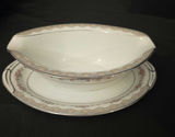 Porcelain dinnerware set with pink floral border and gold trim - thumbnail 3 of 6