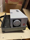 Two Leitz Pradovit Color Autofocus Slide Projector and Slide Containers/Accessories - thumbnail 1 of 12