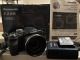 Assorted Cameras, Camera Accessories, and Lens Cases - thumbnail 14 of 30