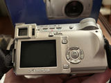 Assorted Cameras, Camera Accessories, and Lens Cases - thumbnail 26 of 30