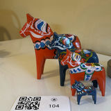 Set of Four Painted Wooden Dala Horse Figurines - by Nils Olssen - thumbnail 1 of 11