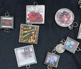 Assorted vintage jewelry charms and decorative keepsake boxes - thumbnail 2 of 7