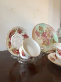Floral porcelain dinnerware set with teacups, saucers, plates and serving dish - thumbnail 4 of 8