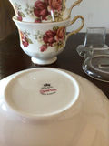 Floral porcelain dinnerware set with teacups, saucers, plates and serving dish - thumbnail 6 of 8