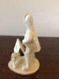 White ceramic cloaked figure with animal companions figurine - thumbnail 2 of 4