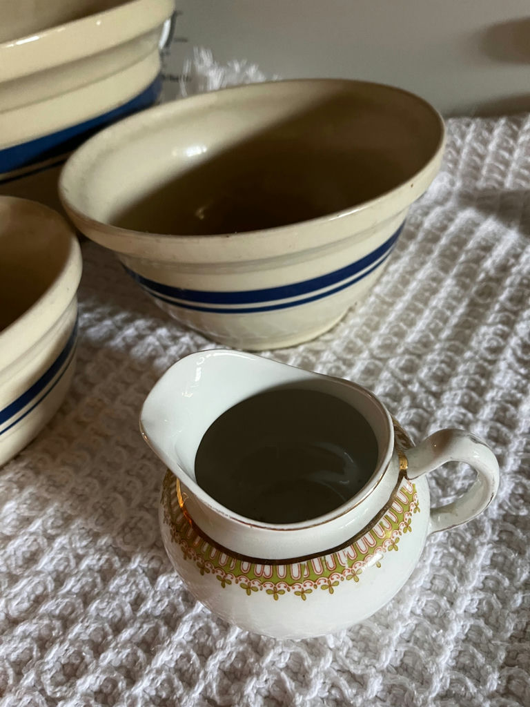 Ceramic bowls with blue stripes and an ornate creamer - image 3 of 3