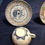 Assorted porcelain bowls, plates, spoons and teacups with Asian motifs - thumbnail 4 of 5