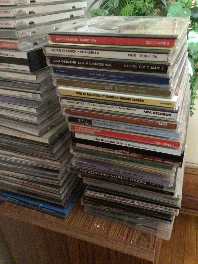Stacks of CD jewel cases and music - image 2 of 4