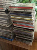 Stacks of CD jewel cases and music - thumbnail 2 of 4