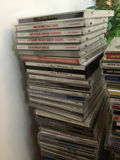 Stacks of CD jewel cases and music - thumbnail 3 of 4