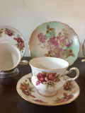 Floral porcelain dinnerware set with teacups, saucers, plates and serving dish - thumbnail 3 of 8
