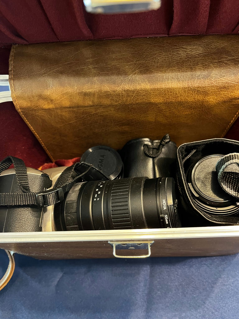 Minolta 35mm SLR camera with zoom lens and accessories in a leather case - image 1 of 3