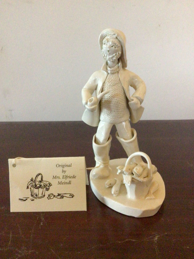 White ceramic cloaked figure with animal companions figurine - image 1 of 4