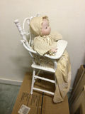 Doll in White Wicker High Chair - thumbnail 1 of 2