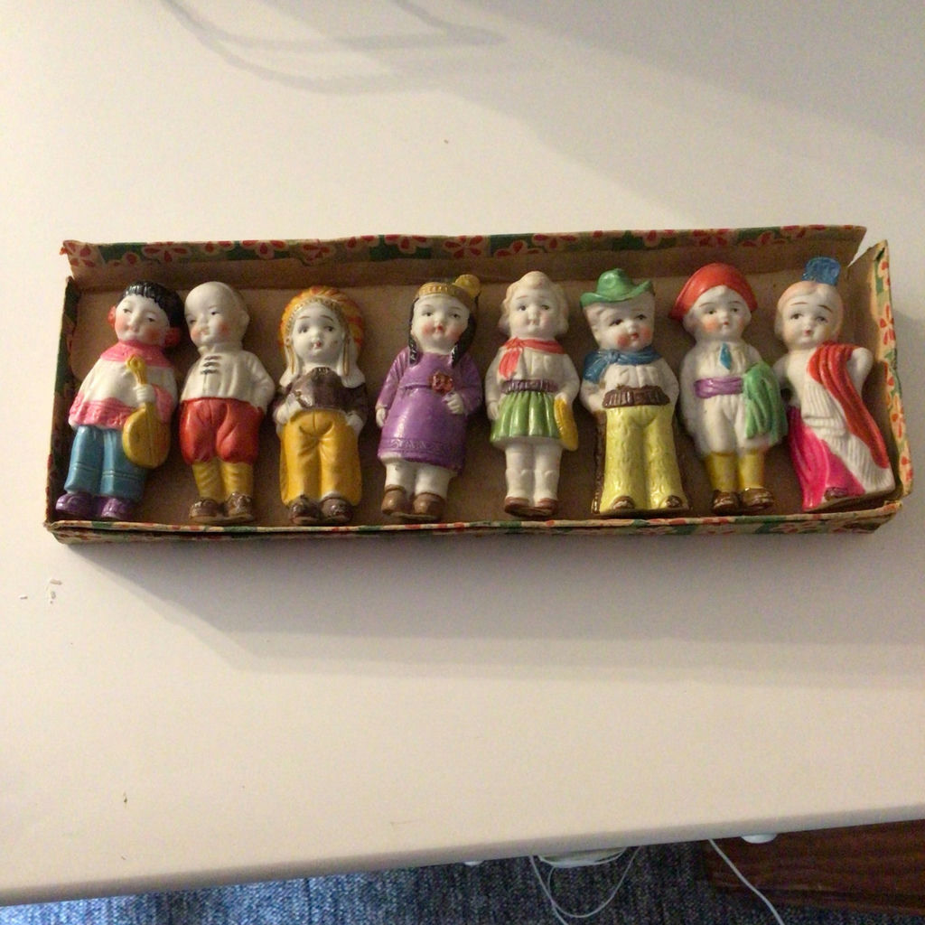 Ten colorful porcelain Chinese figurines in varied outfits - image 2 of 2