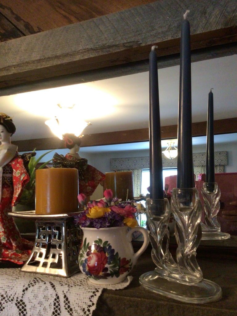 Decorative shelf arrangement with plants, a kimono-doll figurine, candles, and floral ceramics - image 4 of 5