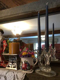 Decorative shelf arrangement with plants, a kimono-doll figurine, candles, and floral ceramics - thumbnail 4 of 5