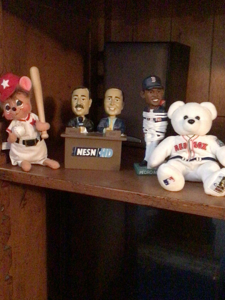 Baseball-themed stuffed animals and figurines on a shelf - image 1 of 1