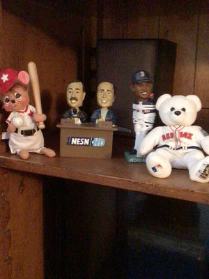 Baseball-themed stuffed animals and figurines on a shelf - Image 1 of 1