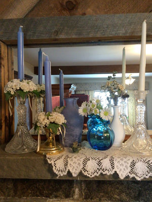 Blue Candles, Glass Vases, and Floral Arrangements on Lace Mantel - Image 1 of 3