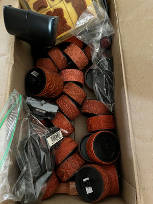 Assorted craft supplies: rubber stamps, embossed leather bracelets, and plastic fruit shapes - Image 1 of 3