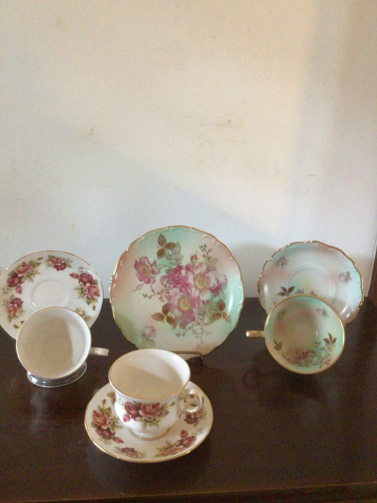 Floral porcelain dinnerware set with teacups, saucers, plates and serving dish - image 1 of 8