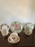 Floral porcelain dinnerware set with teacups, saucers, plates and serving dish - thumbnail 1 of 8