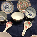 Assorted porcelain bowls, plates, spoons and teacups with Asian motifs - thumbnail 1 of 5