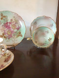 Floral porcelain dinnerware set with teacups, saucers, plates and serving dish - thumbnail 2 of 8