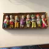 Ten colorful porcelain Chinese  figurines in varied outfits - thumbnail 1 of 2