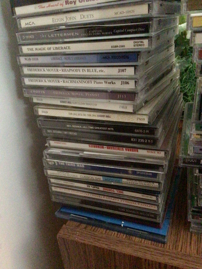 Stacks of CD jewel cases and music - image 4 of 4