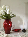 Red glass vase with white tulips, swan-handle dish, and candle holder - thumbnail 1 of 1