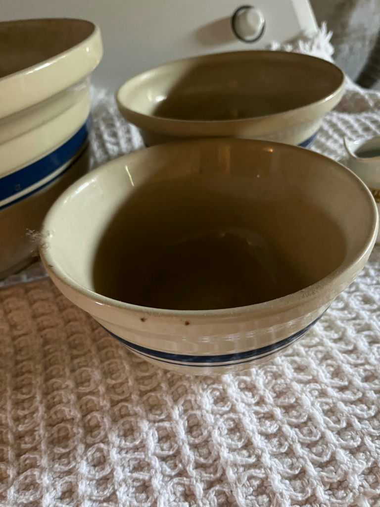 Ceramic bowls with blue stripes and an ornate creamer - image 2 of 3