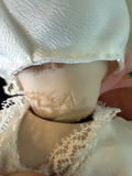 Porcelain Doll in White Dress and Bonnet - thumbnail 2 of 3