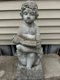 Child Figurine Holding an Open Book - thumbnail 2 of 2