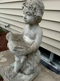Child Figurine Holding an Open Book - thumbnail 1 of 2