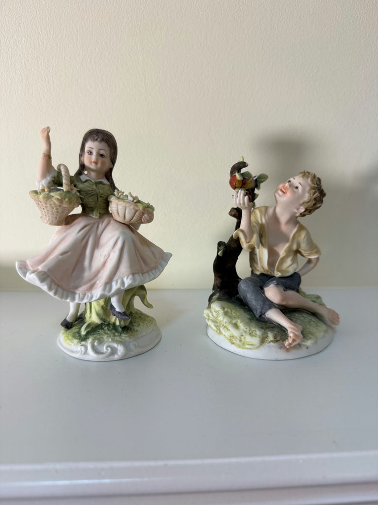 Pair of Porcelain Child Figurines - image 1 of 4