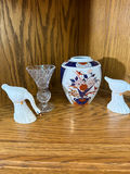 Porcelain Swan Figurines, Cut Glass Vase, and Floral Ceramic Vase - thumbnail 1 of 5