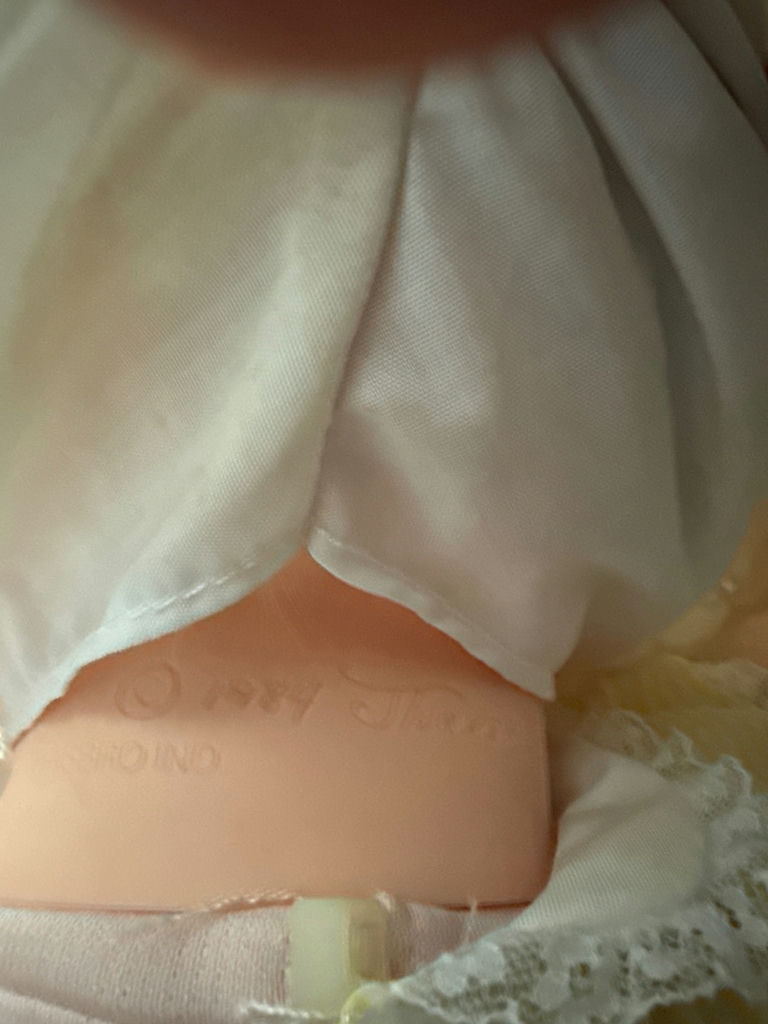 Vintage baby doll on a wooden rocking chair - image 3 of 5