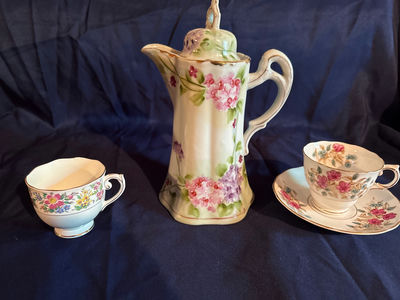 Nippon Floral porcelain teapot with lid and two teacups with saucers - Image 1 of 4